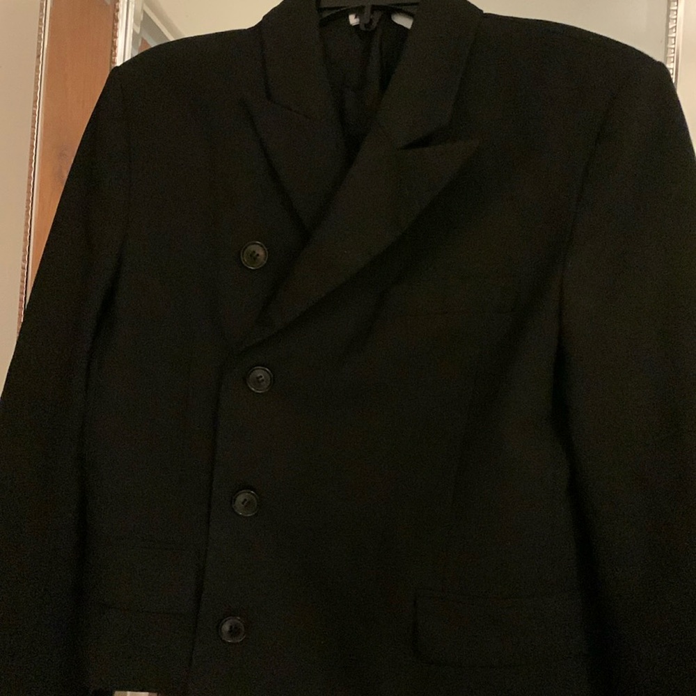 Zara black blazer with 4 pockets front 4 bottoms .